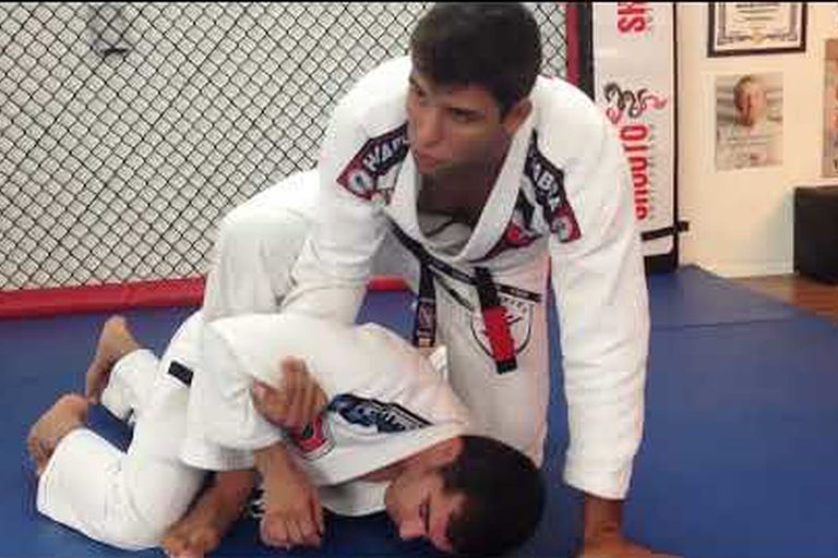 Marcus Buchecha Almeida demonstrating the rolling armbar in BJJ