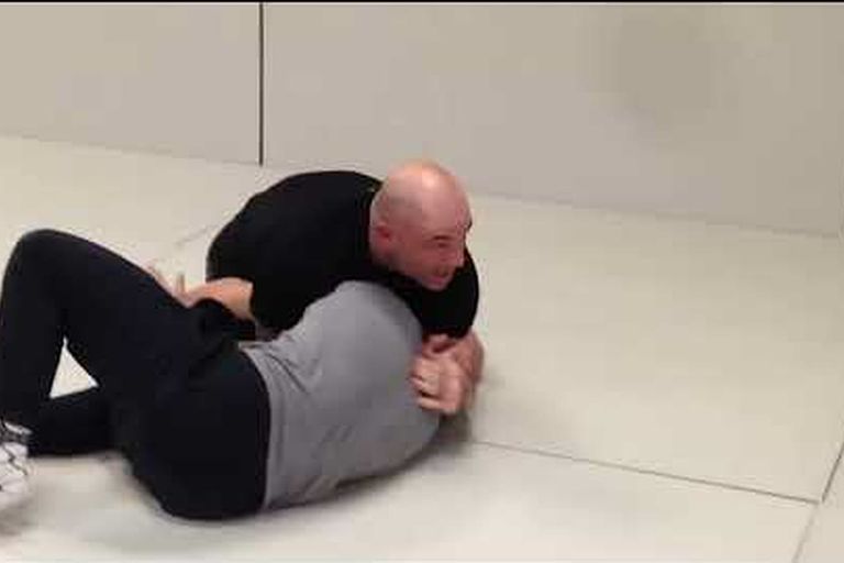Joe Rogan demonstrating a BJJ choke from top control