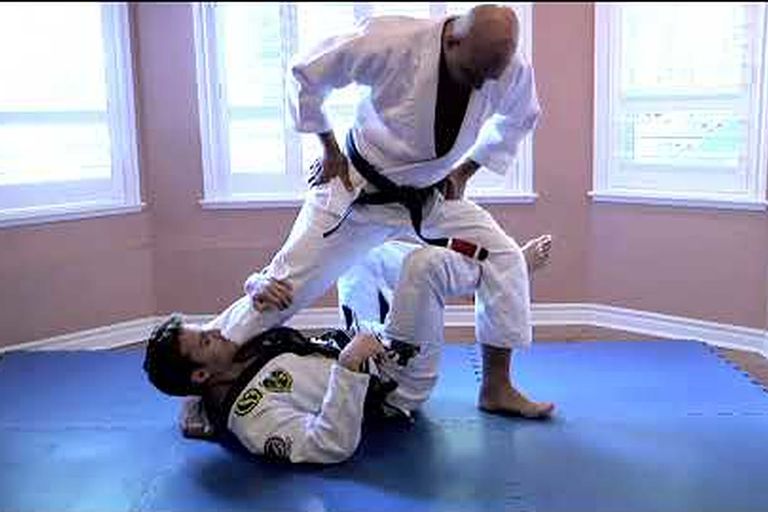 Clark Gracie demonstrating the X-guard drill and sweep in BJJ