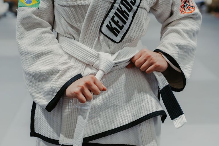 Brazilian Jiu Jitsu competitors grappling in the gi