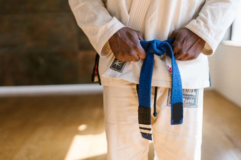 Brazilian Jiu Jitsu competitors grappling in the gi
