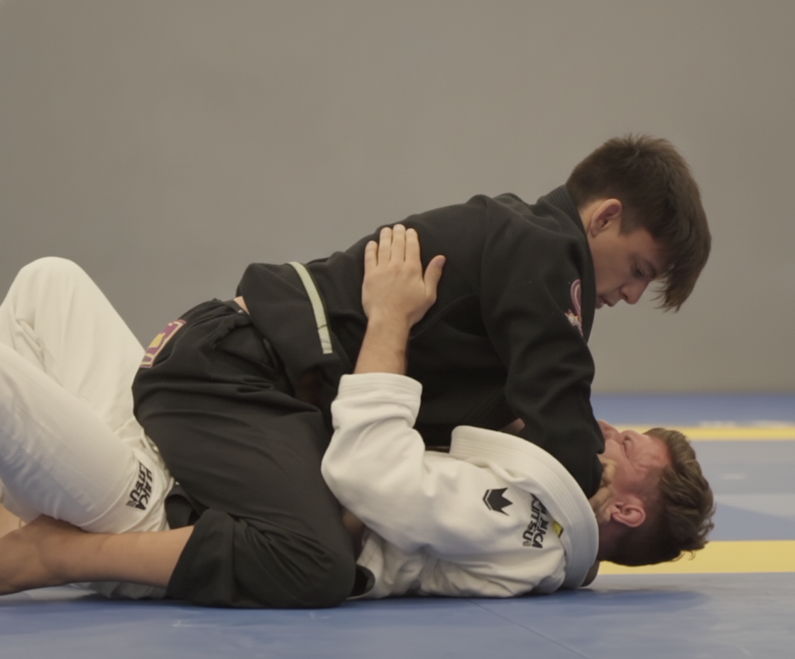 Michael Liera Jr performing an Ezekiel choke